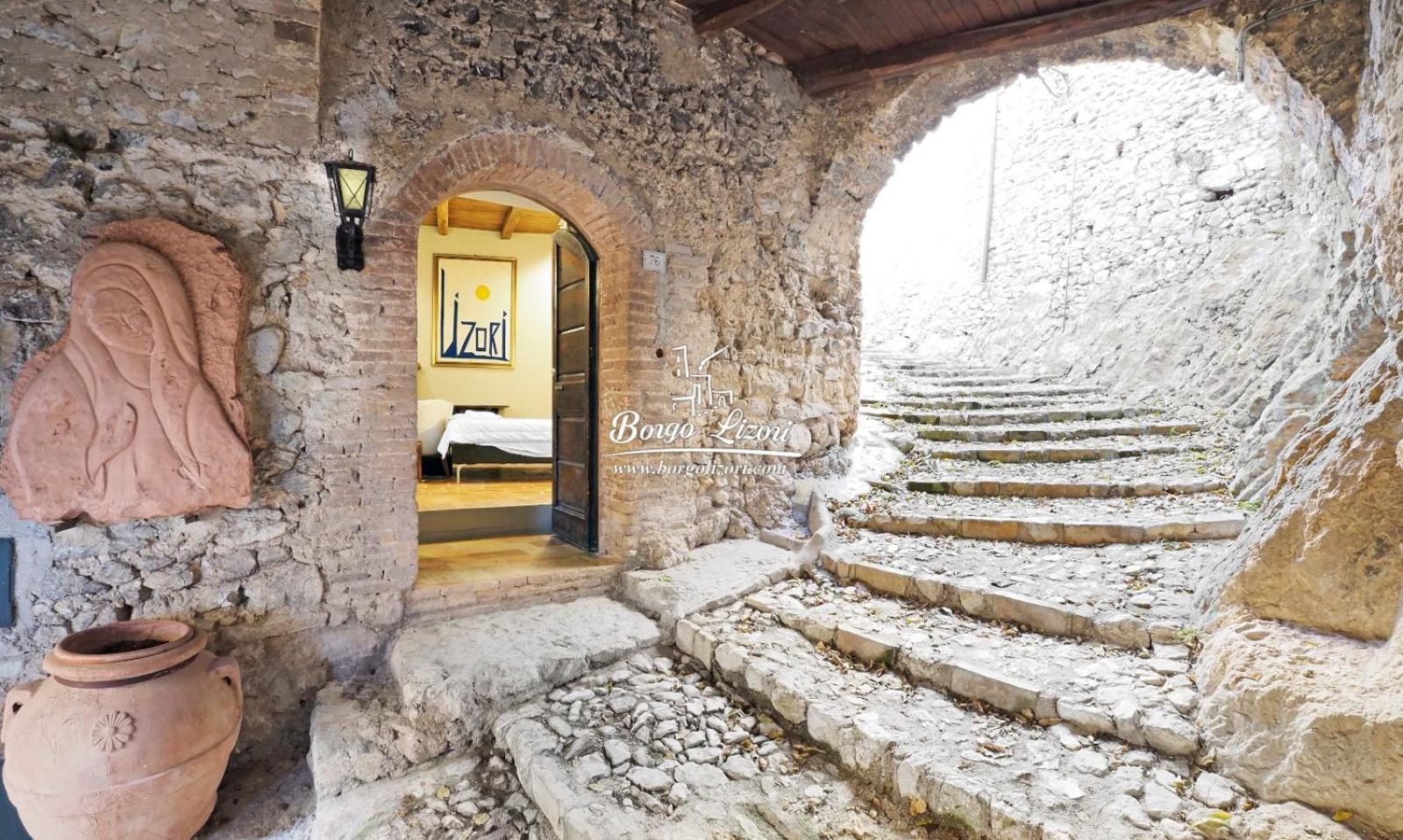 Relais Borgo Lizori Country House Campello sul Clitunno Kültér fotó